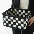 Checkerboard pattern woven felt folding storage basket shown with dimensions 37cm by 29cm by 19.5cm