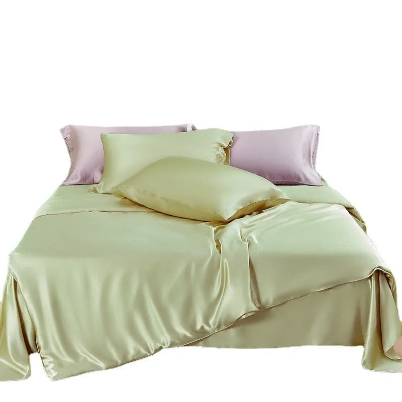 Double-sided solid colour silk duvet cover shown in multiple colour options.