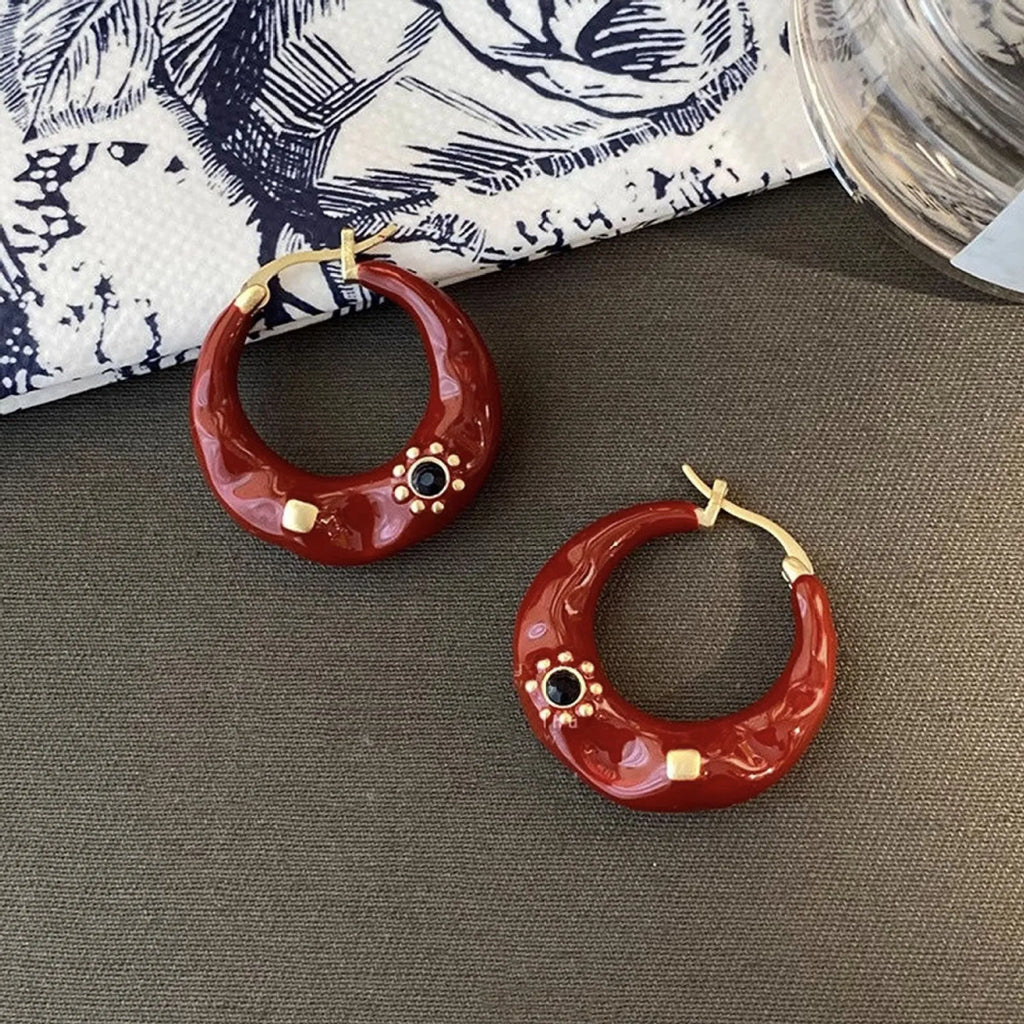 Hong Kong style retro ear studs with drip oil texture and rhinestone decoration in black and red colours
