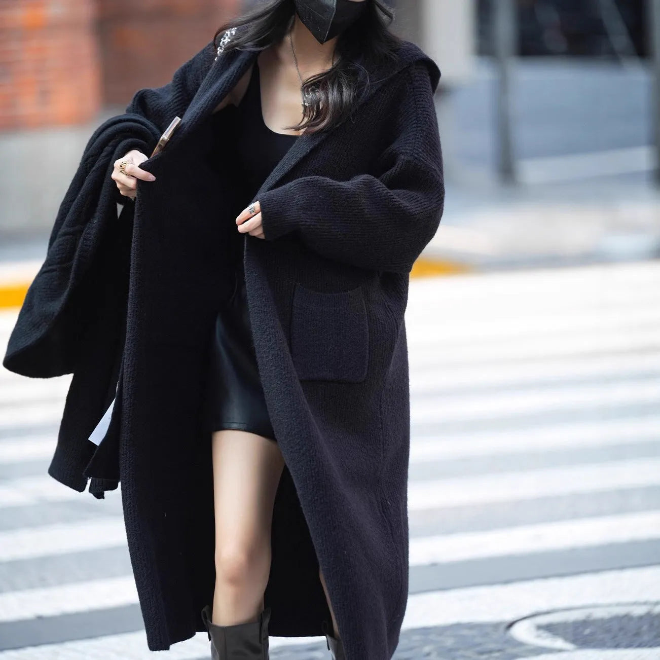 Long grey knitted cardigan sweater with hood showing 80cm length and loose fit trench coat style