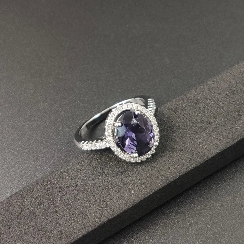 Round zircon ring with electroplated alloy band, available in multiple colours and sizes 6 to 10