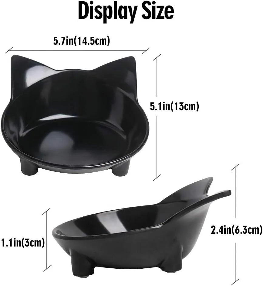 Shallow black melamine cat bowl with non-slip rubber base on a wooden floor.