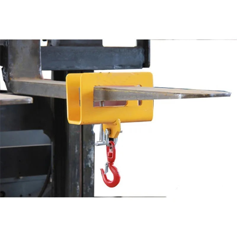 MK forklift crane hook attachment with rotatable drum and safety lock mounted on forklift forks.