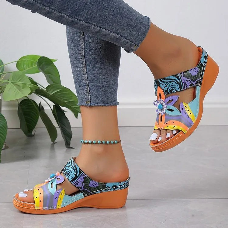 Ethnic pattern slope heel slippers in cowhide with rubber sole available in multiple colours