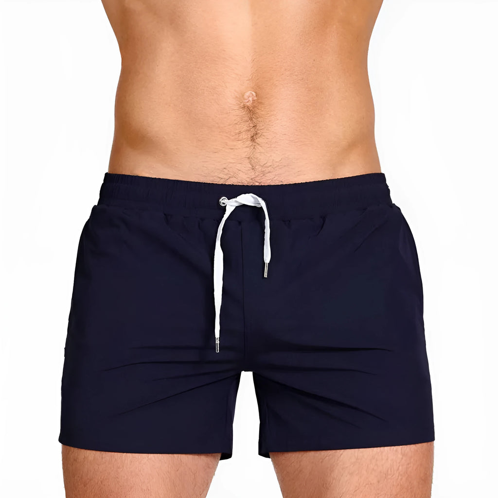 Mesh lining swimming sports fitness shorts in polyester available in six solid colours