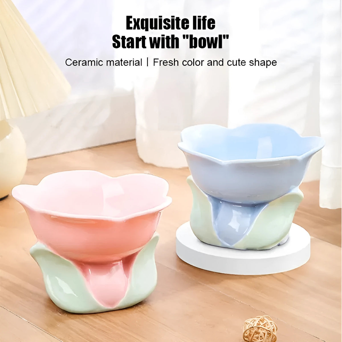 Blue ceramic raised pet bowl with floral pattern and non-slip base for cats or small dogs