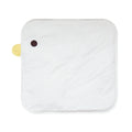 Yellow chick-shaped pet cooling mat on a wooden floor, showing non-stick fabric surface.