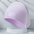 Silicone swimming cap with water drop texture in various solid colours for adults