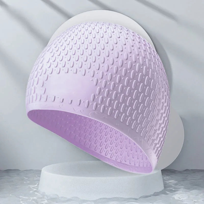 Silicone swimming cap with water drop texture in various solid colours for adults