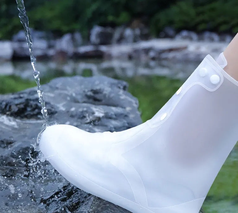 White PVC women's waterproof shoe covers high top design with reusable construction for rain protection