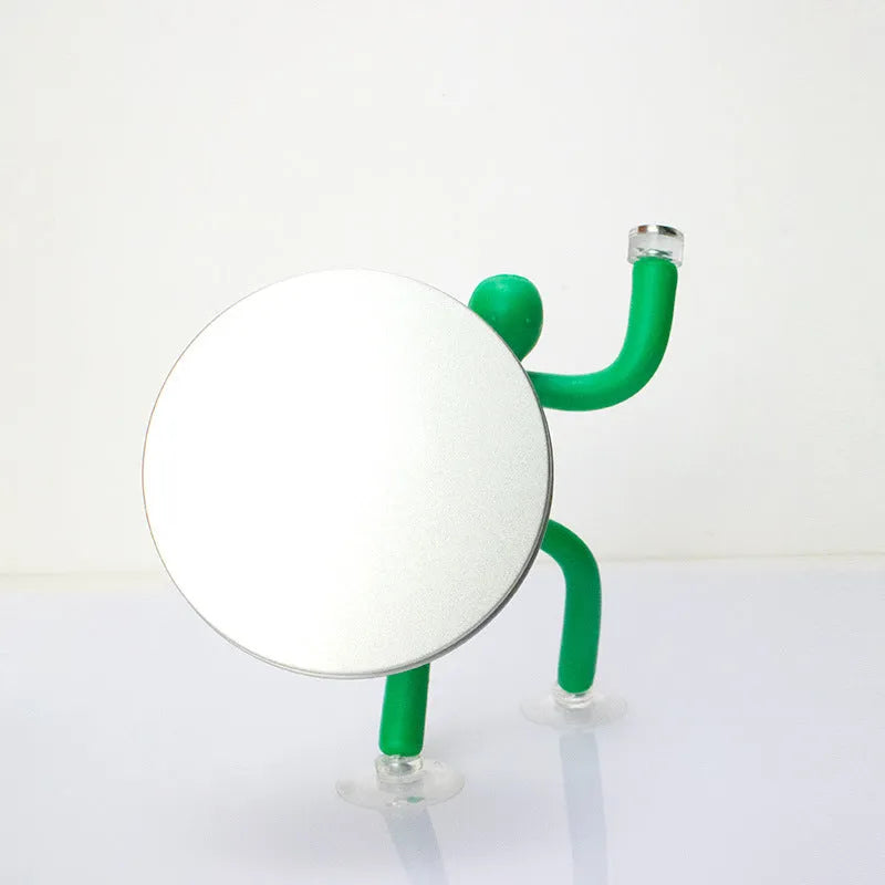 Small plastic decompression toy ornament in green with reject anxiety text, in iron box