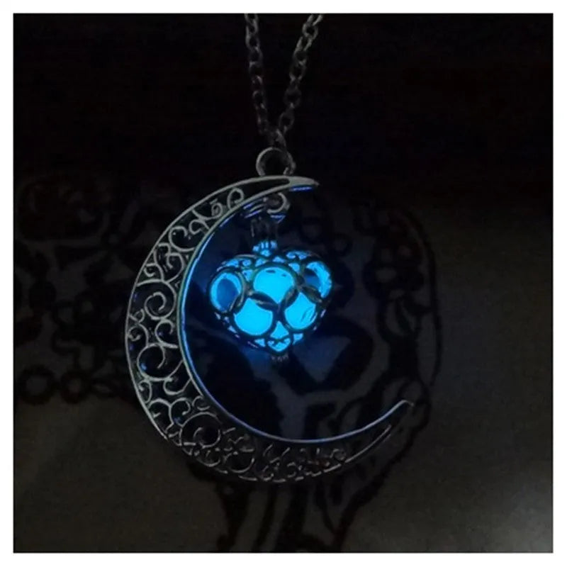 Glowing pendant necklace with silver plated chain and luminescent glow in dark, 3.6cm wide pendant