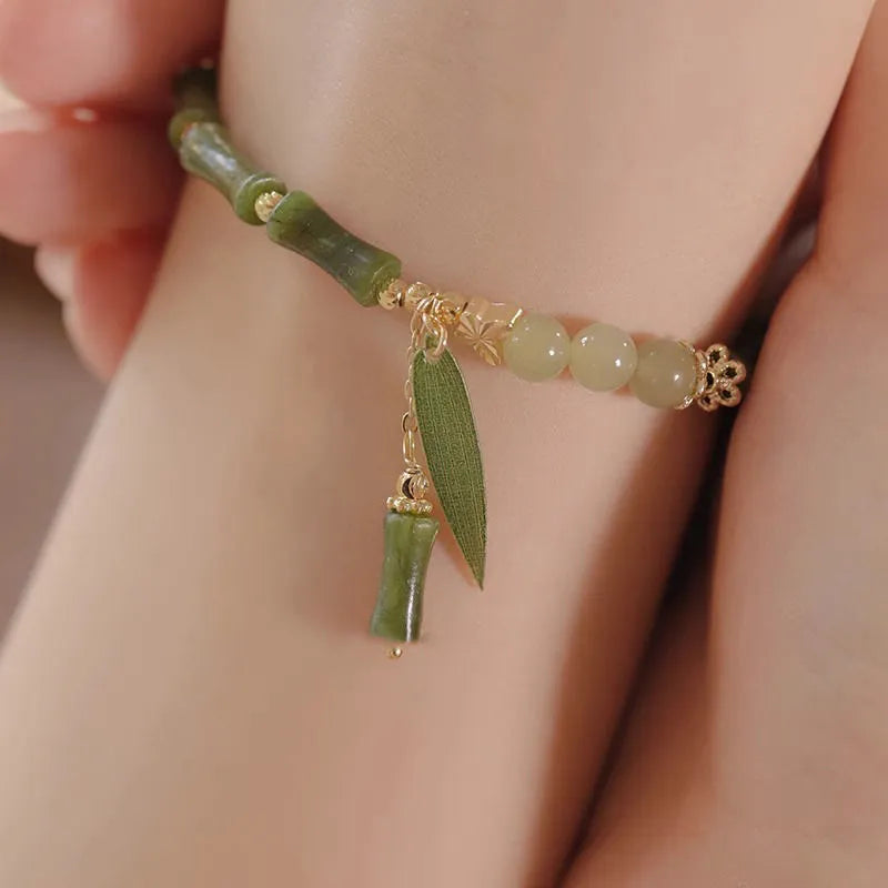 Chinese style glass bamboo leaf bracelet for women with manual craft details.