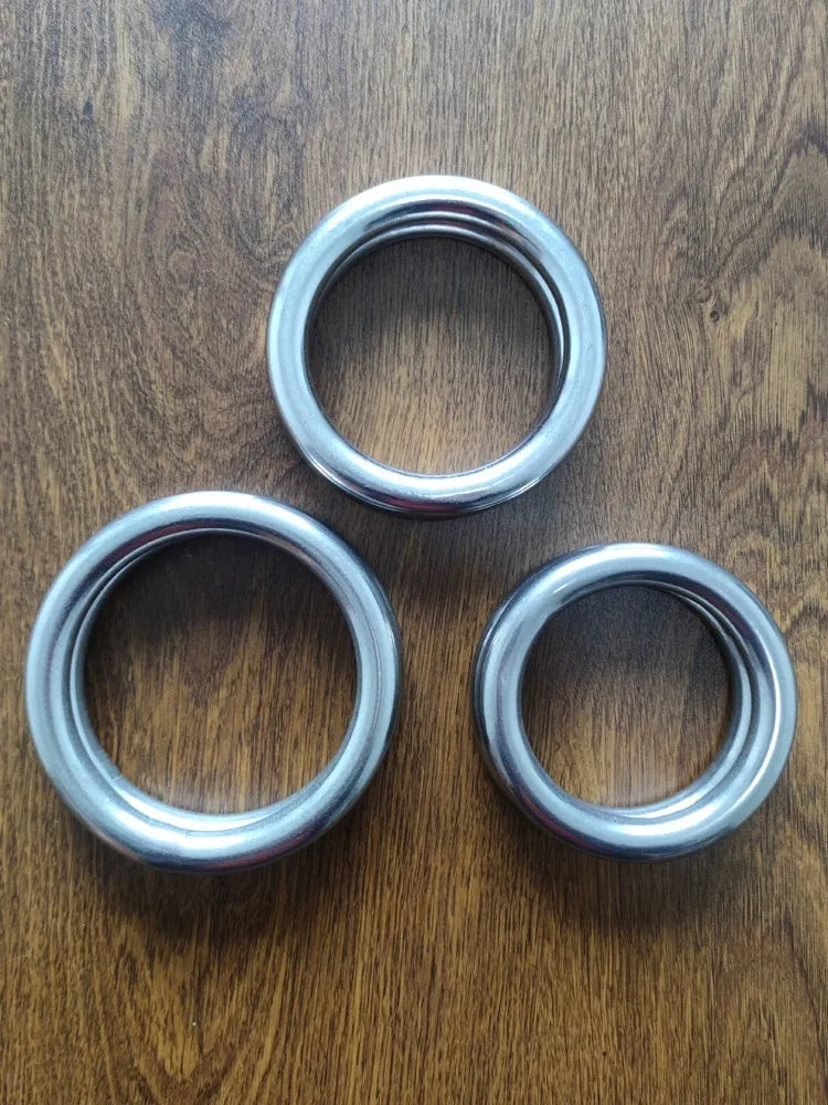 Wing Chun carbon steel training ring with electroplated finish, shown in small, medium, and large sizes.