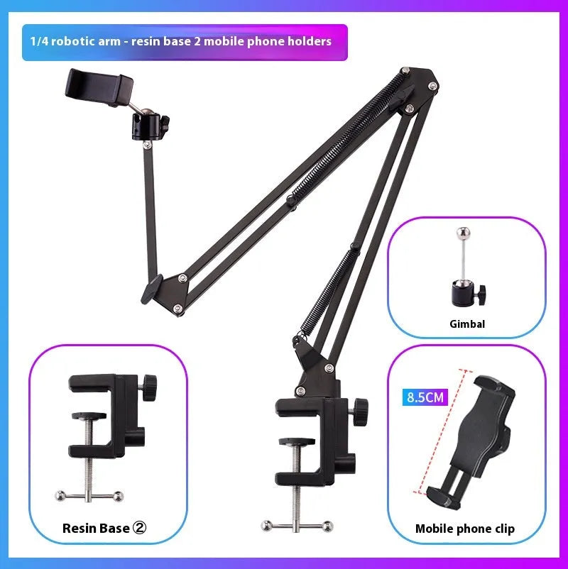 Black foldable metal desktop cantilever bracket holding a tablet, showing adjustable arm and clamp.