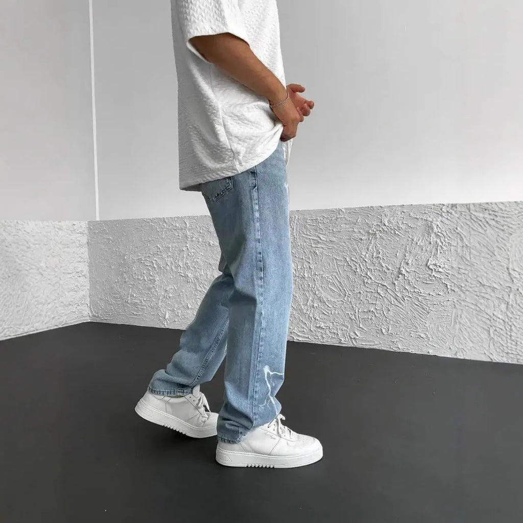 Blue men's straight-leg denim jeans with mid-waist design and zipper fly closure