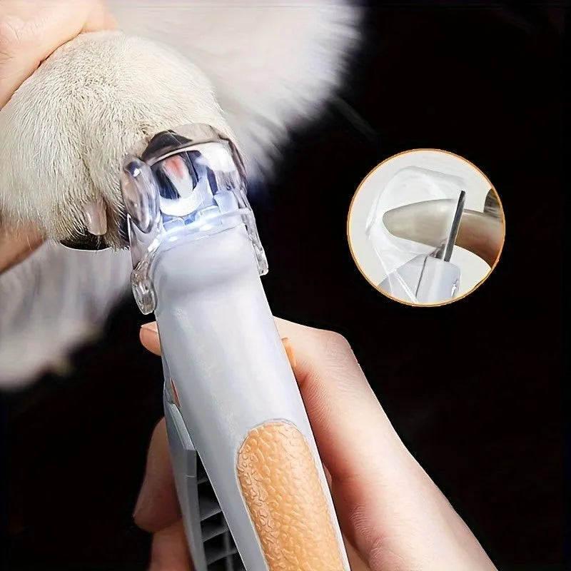 Yellow LED pet nail trimmer with magnifying glass and light on, for trimming cat and dog claws.
