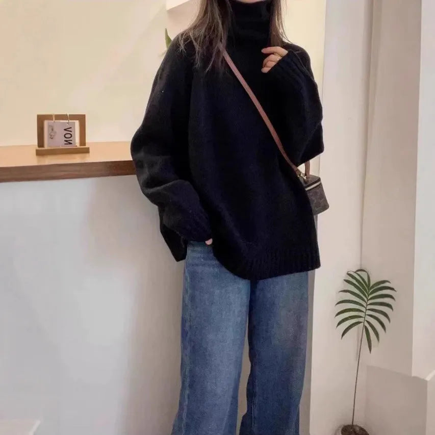 Women's loose turtleneck sweater with a thick curling pile collar in a choice of four colours.