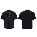 Men's black loose fit polo t-shirt with square collar and embroidered sequin detailing on short sleeves