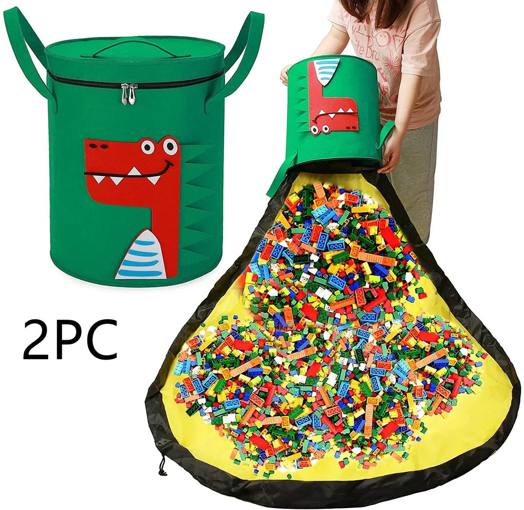 Green felt cube storage bag open as a play mat next to toys, showing pull rope closure