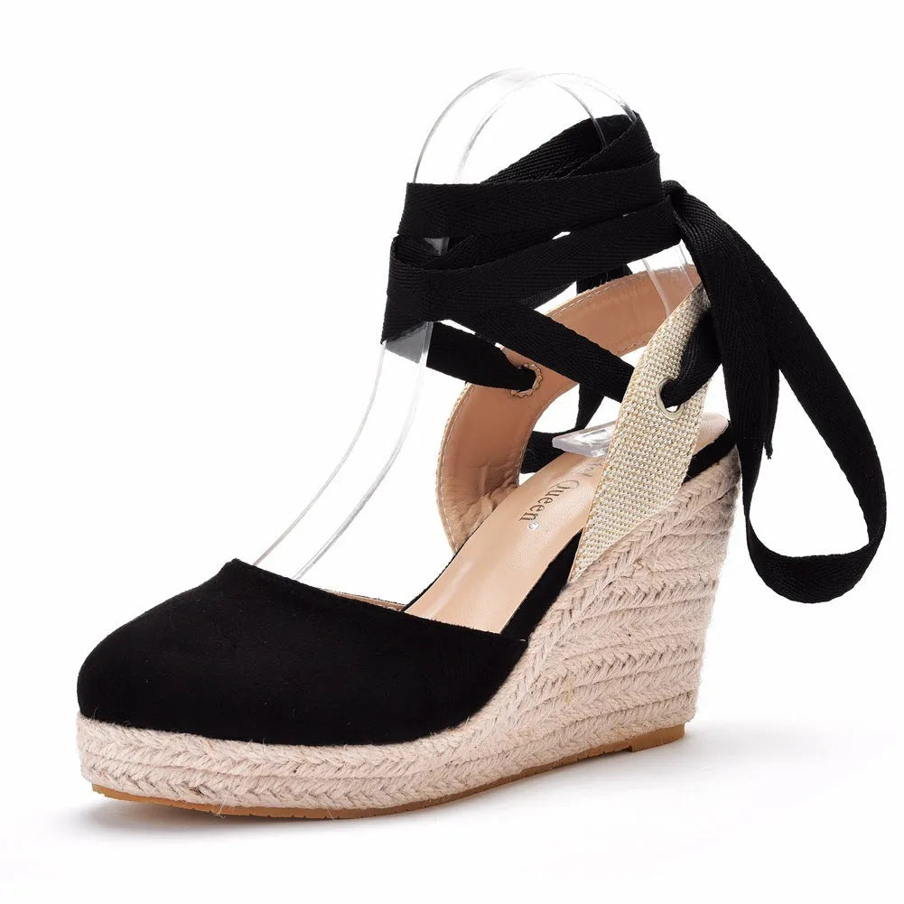 Women's apricot wedge sandals with buckle strap and beaded tassel detail on a low-cut artificial PU upper.