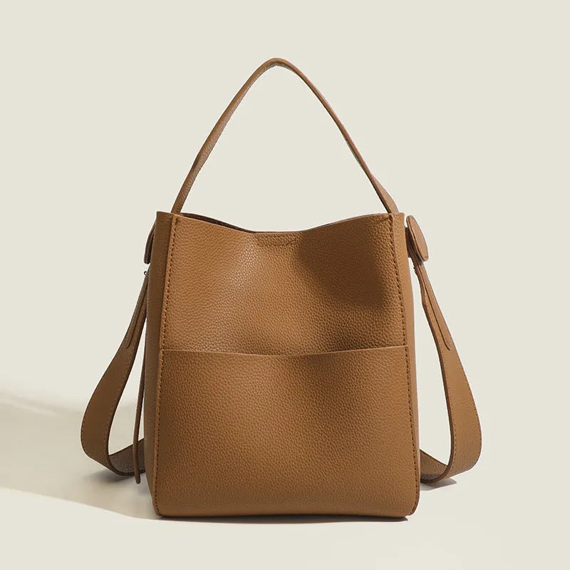 Soft PU bucket messenger bag in elephant gray with sewing line detailing and single shoulder strap