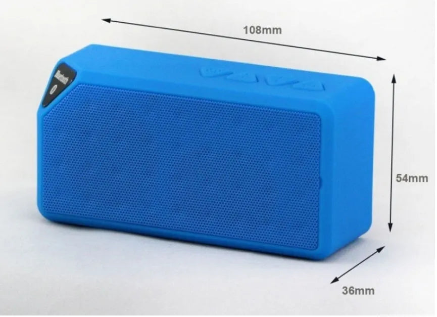 Cannon X3 small cube-shaped wireless Bluetooth portable speaker shown in one of five colours: black, blue, green, red, or yellow.