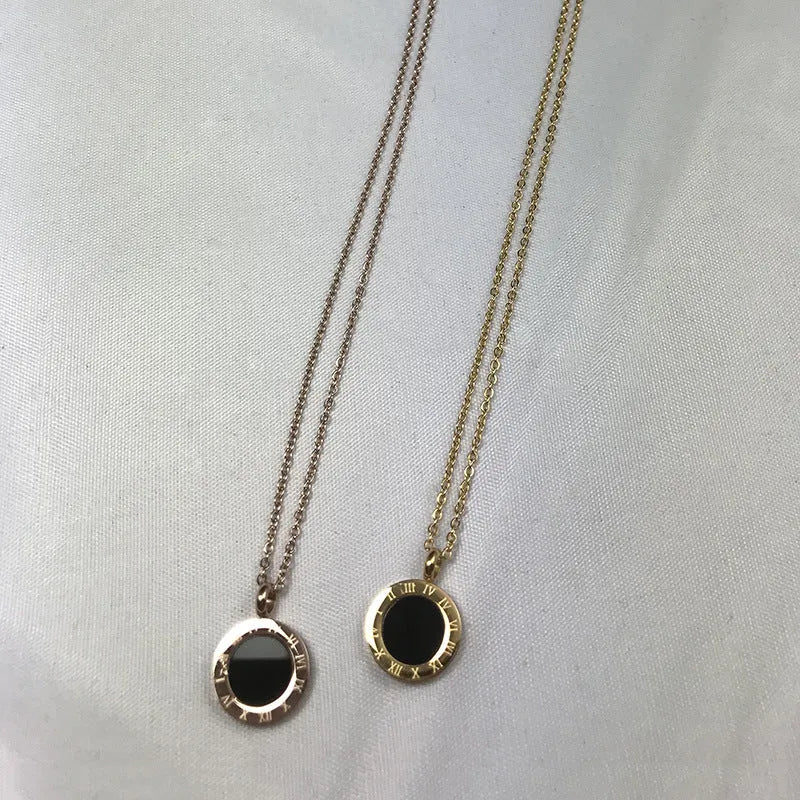 Roman pattern black shell pendant round titanium steel electroplated gold finish