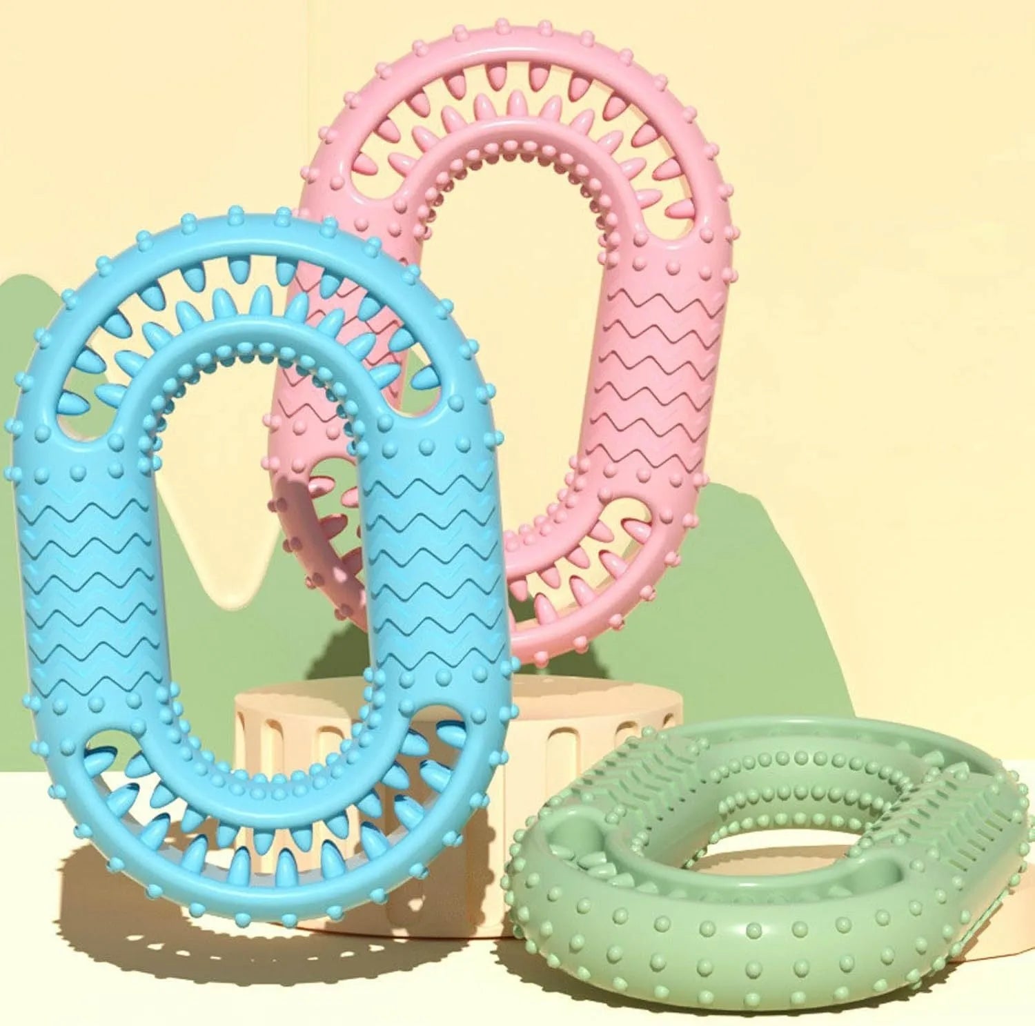 Blue O-ring shaped dog chew toy for aggressive chewers and dental care.
