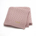 Solid colour infant hug blanket with textured lines in acrylic fabric
