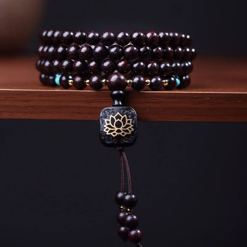 Zambia rosewood Buddha beads bracelet with flat lotus pendant showing 108 wooden beads