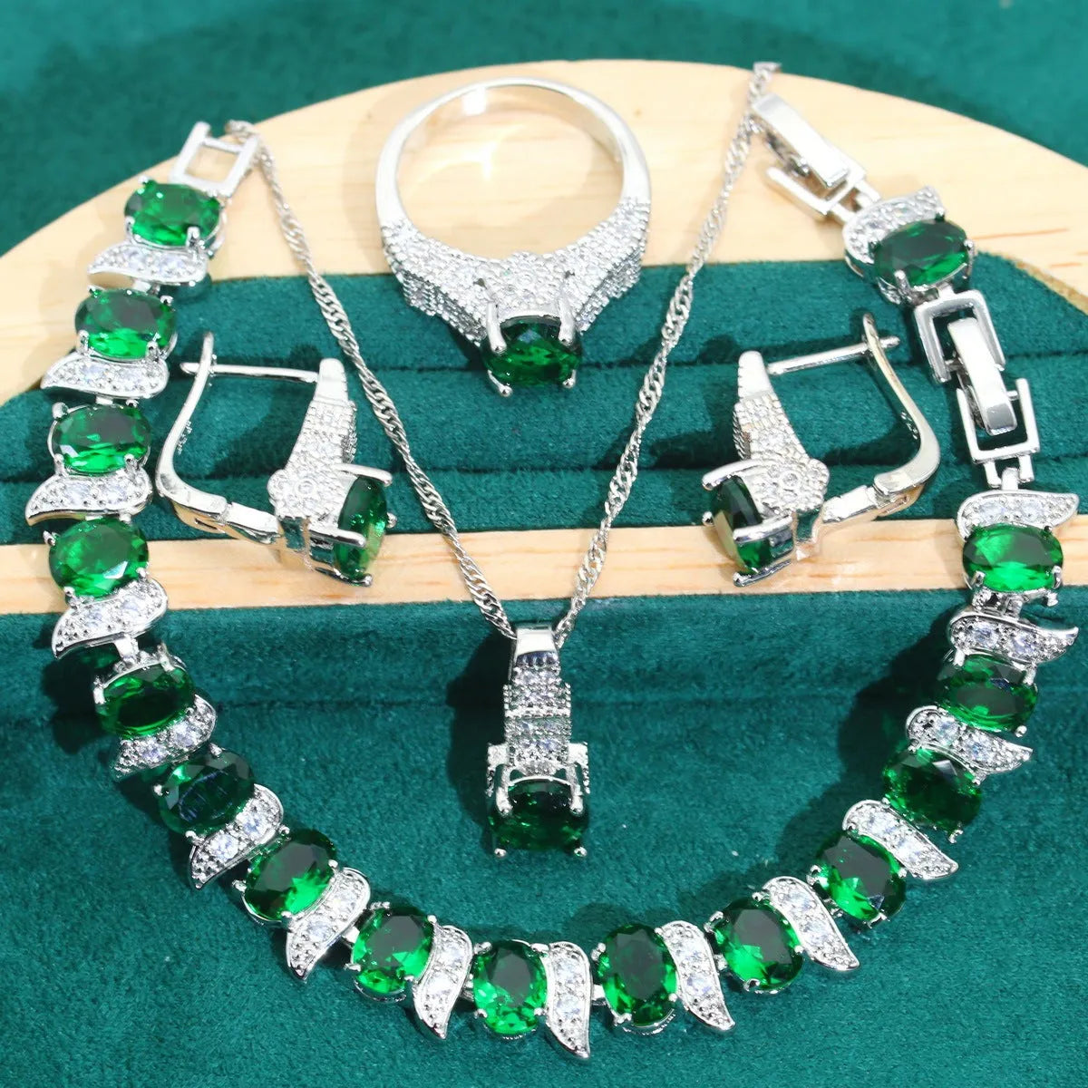 Bridal zircon necklace, bracelet, earrings, and ring four-piece jewellery set in alloy with water wave chain design.