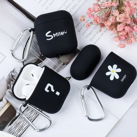 Black and pink hard PC protective cases for AirPods with decorative flower, love, and smiley face designs