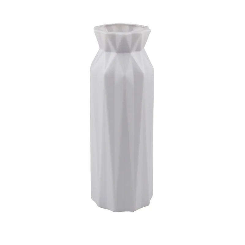 Green drop-resistant melamine plastic vase with 7.2cm base on a wooden desk.