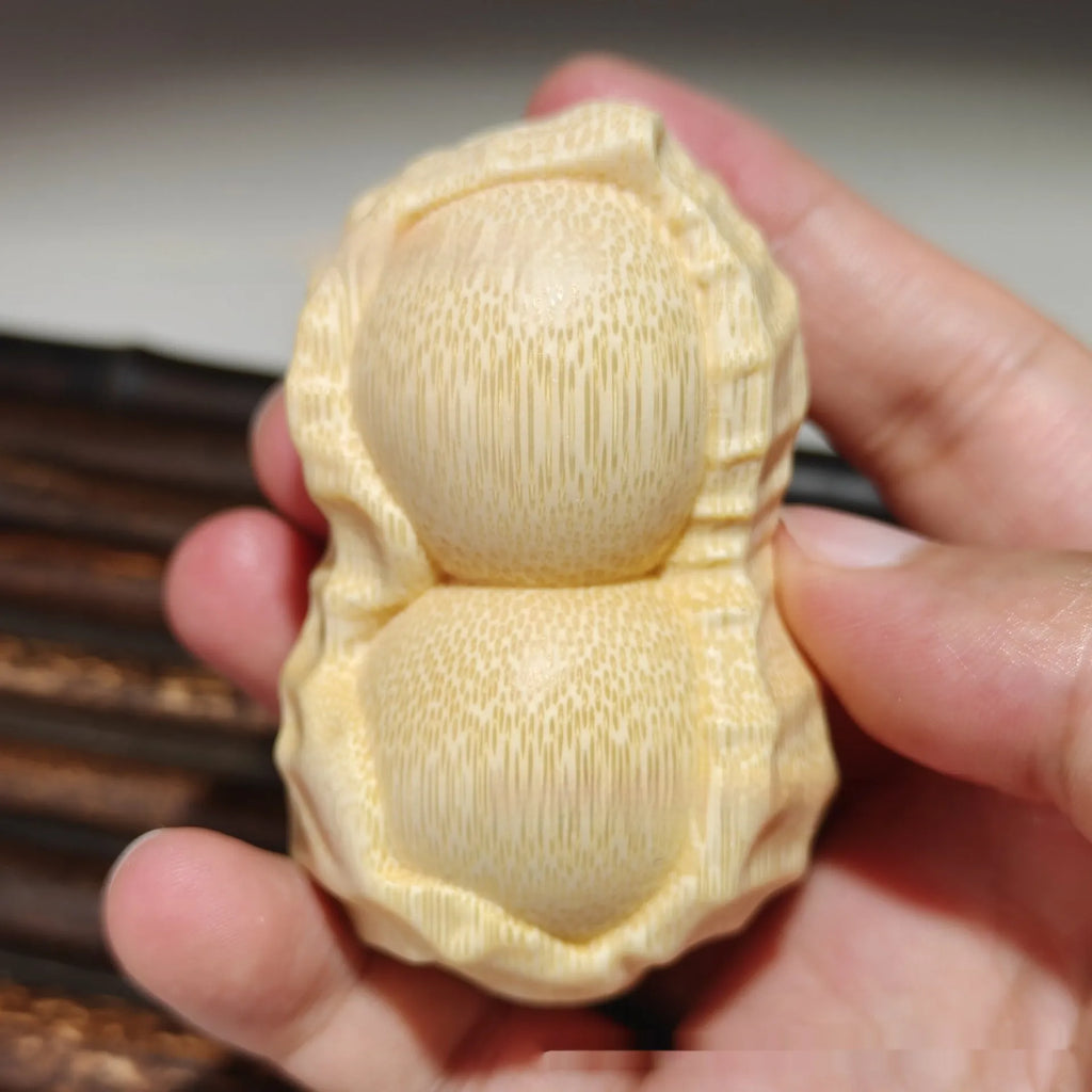 Natural bamboo peanut ornament with modern simplicity design for multiple gifting occasions