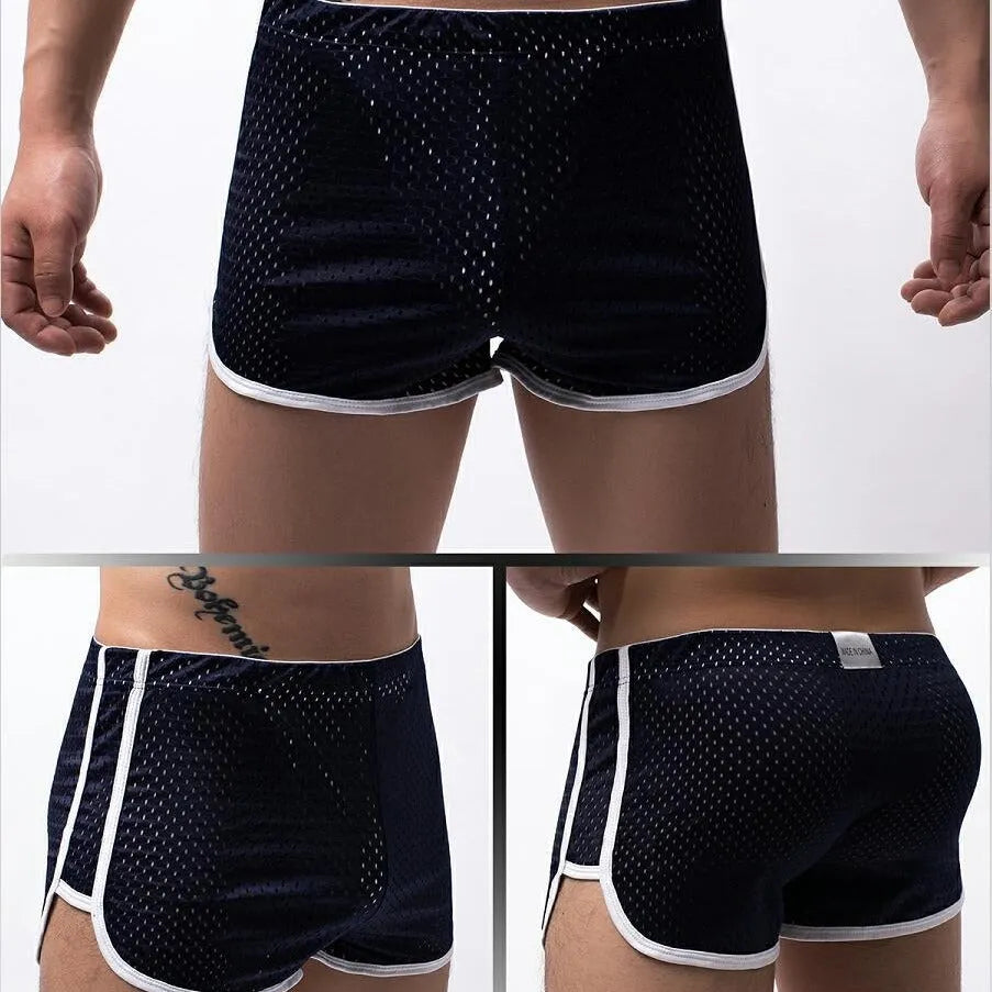 Men's black three-point boxer briefs made from cotton and nylon fabric.