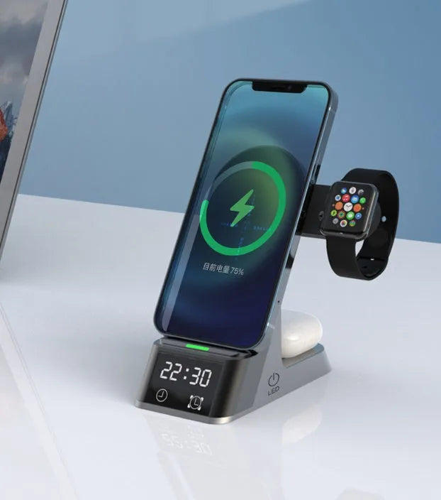Black multifunctional wireless charging alarm clock with six ports showing smartphone on charging pad