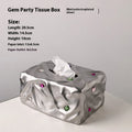 Ceramic tissue box in matte white or silver luxury finish for home decor.