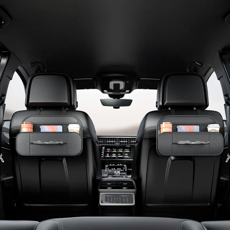 Black leather car seat rear storage bag with adjustable compartments mounted on vehicle seat