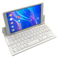 Black foldable Bluetooth keyboard for tablets with aluminium bottom and wrist support