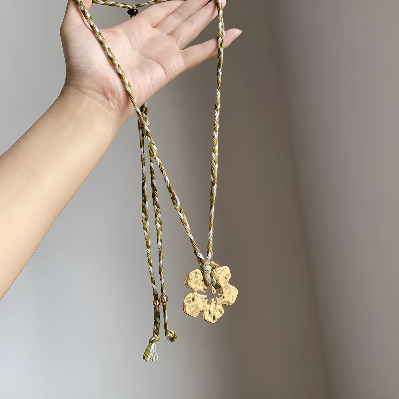 Gold hibiscus rosa-sinensis resin pendant necklace with artificial crystal bow on alloy chain for ladies