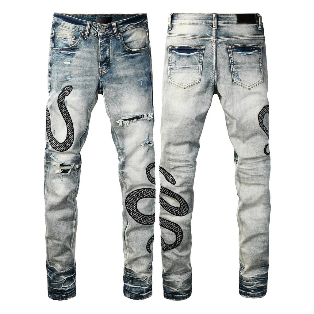 Distressed blue skinny jeans with wash detailing and button fly on mid waist design