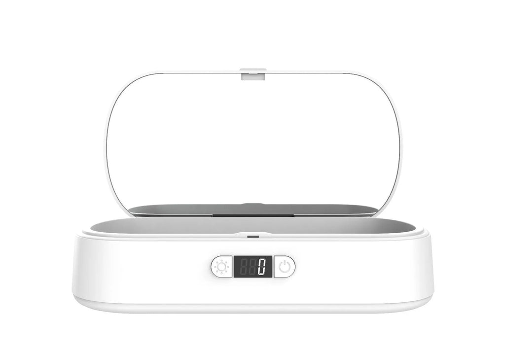 White portable UV sterilisation box with wireless charging for phones and jewellery disinfection