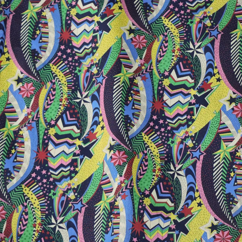 Blue cotton fabric with digitally printed plant and flower design showing 145cm width