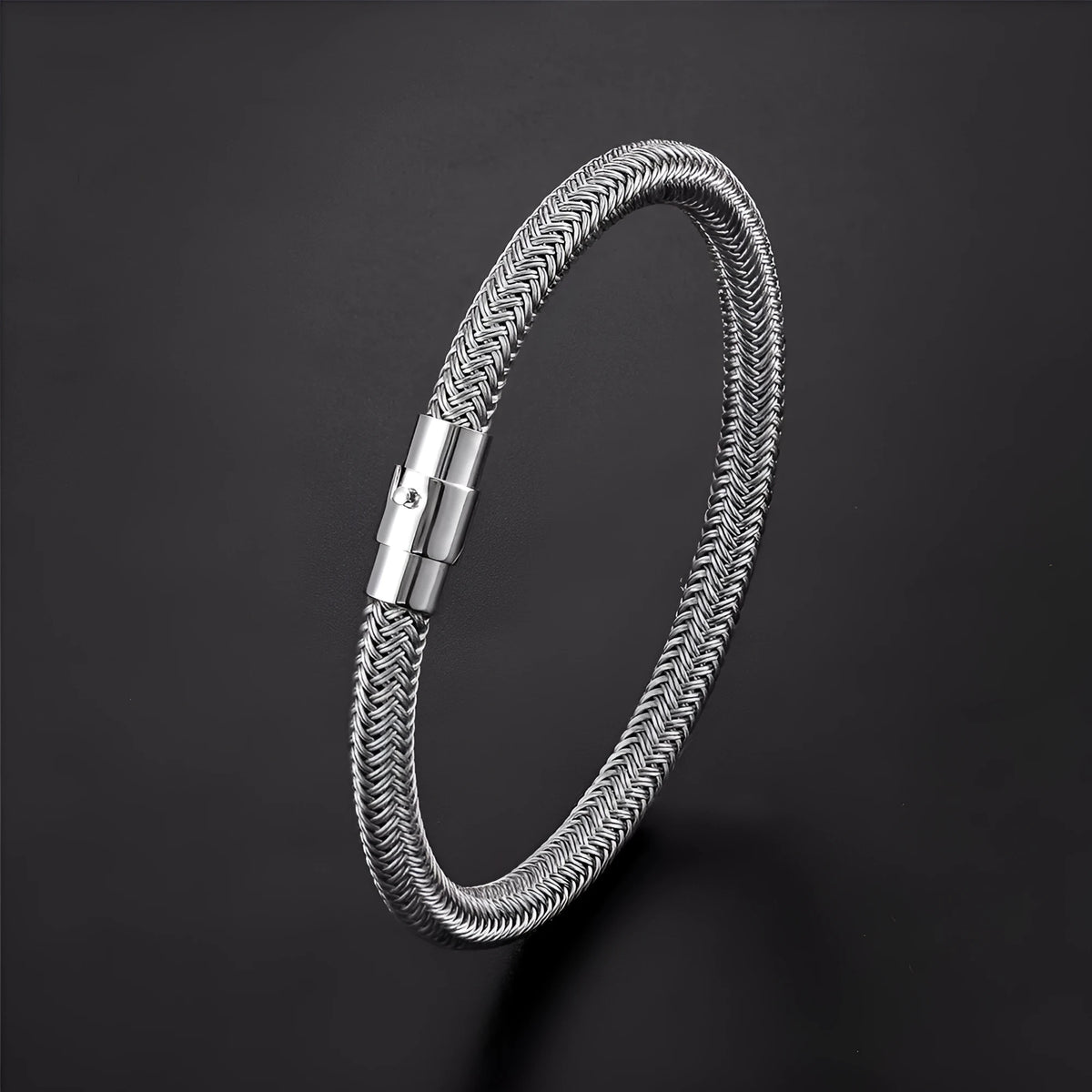 Geometric titanium steel men's bracelet with a magnet socket for charms, shown in a silver finish.