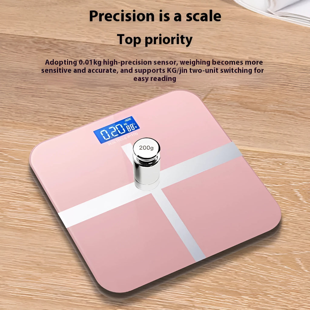 Household weighing scale in rose gold finish with digital display for body weight measurement