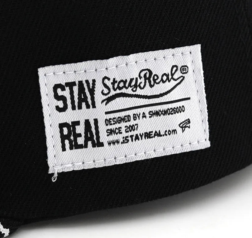 Cotton baseball cap with embroidered letter detail in adjustable size