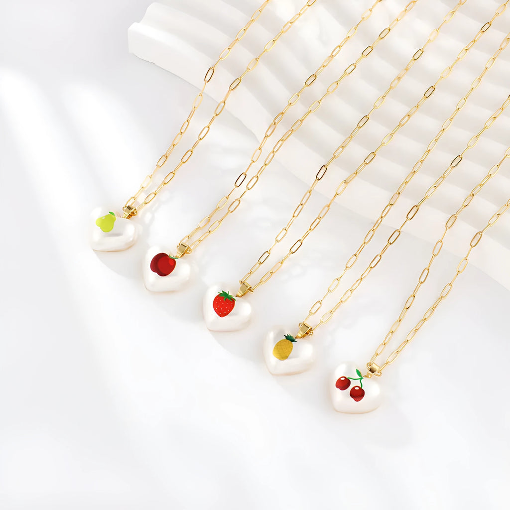 Geometric fruit pendant necklace on adjustable 21-50cm chain with strawberry, pineapple, apple, cherry, and pear colour options