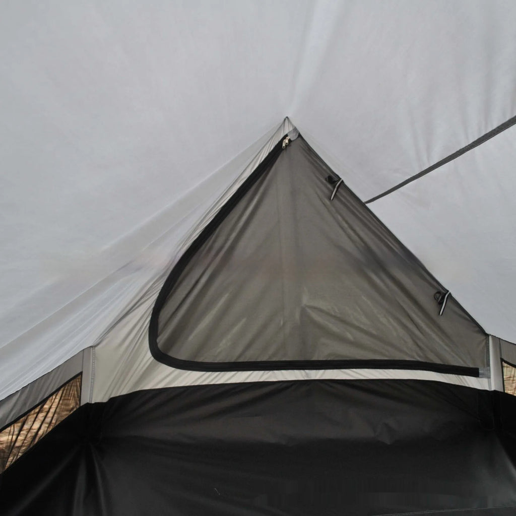 Brown A-line pole-free cabin tent set up with hiking poles showing spacious interior for 2-3 campers
