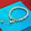 Natural Hetian jade and pearl pendant women's bracelet with gold-coloured electroplated alloy metal in Chinese style